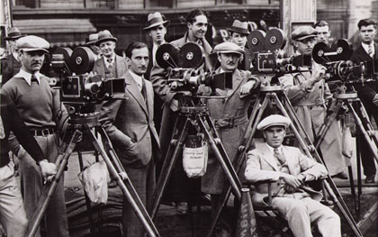 Capra (seated) working for Columbia in 1927 (Columbia Pictures)
